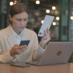 Budget traveler comparing travel insurance - travel insurance hacks guide