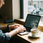 Remote Work Travel digital nomad working remotely from café in Chiang Mai Thailand